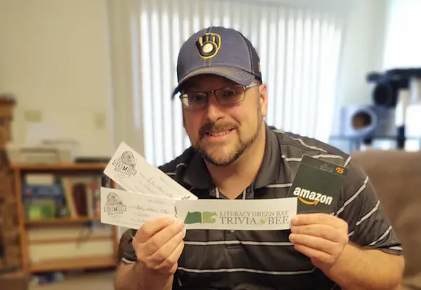 Brian Hallman with TrivaBee prizes